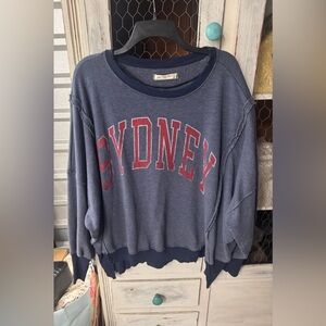 Free People sydney graphic oversized sweater in washed navy